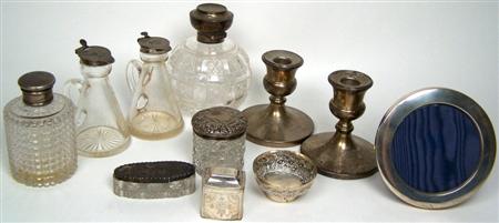 Appraisal: A small collection of silver mounted bottles the cut glass