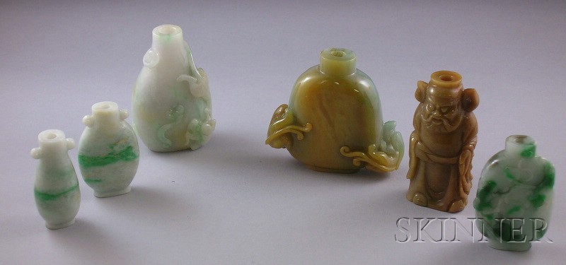 Appraisal: Six Carved Jade and Stone Snuff Bottles a brown standing