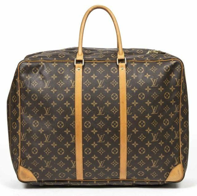 Appraisal: Louis Vuitton Sirius suitcase in monogram coated canvas with brass