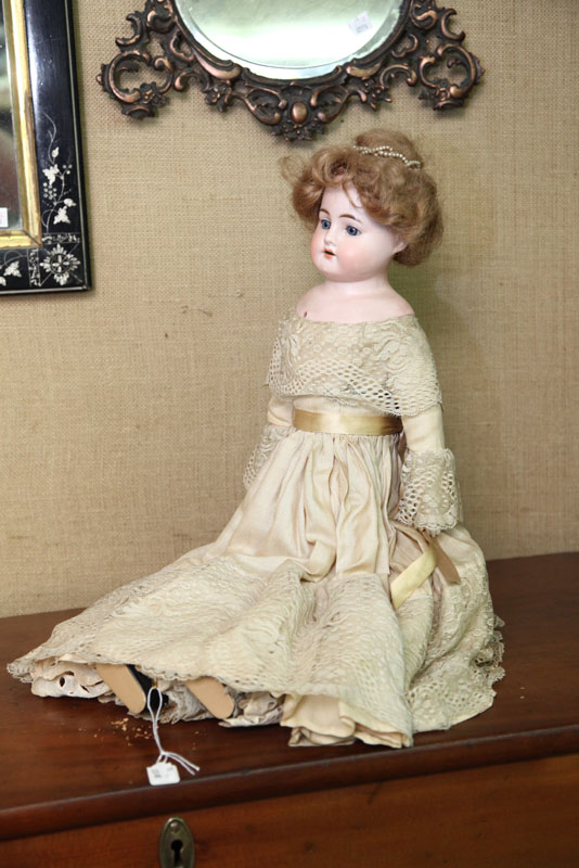 Appraisal: BISQUE HEAD DOLL A Heinrich Handwerck doll with blue paperweight