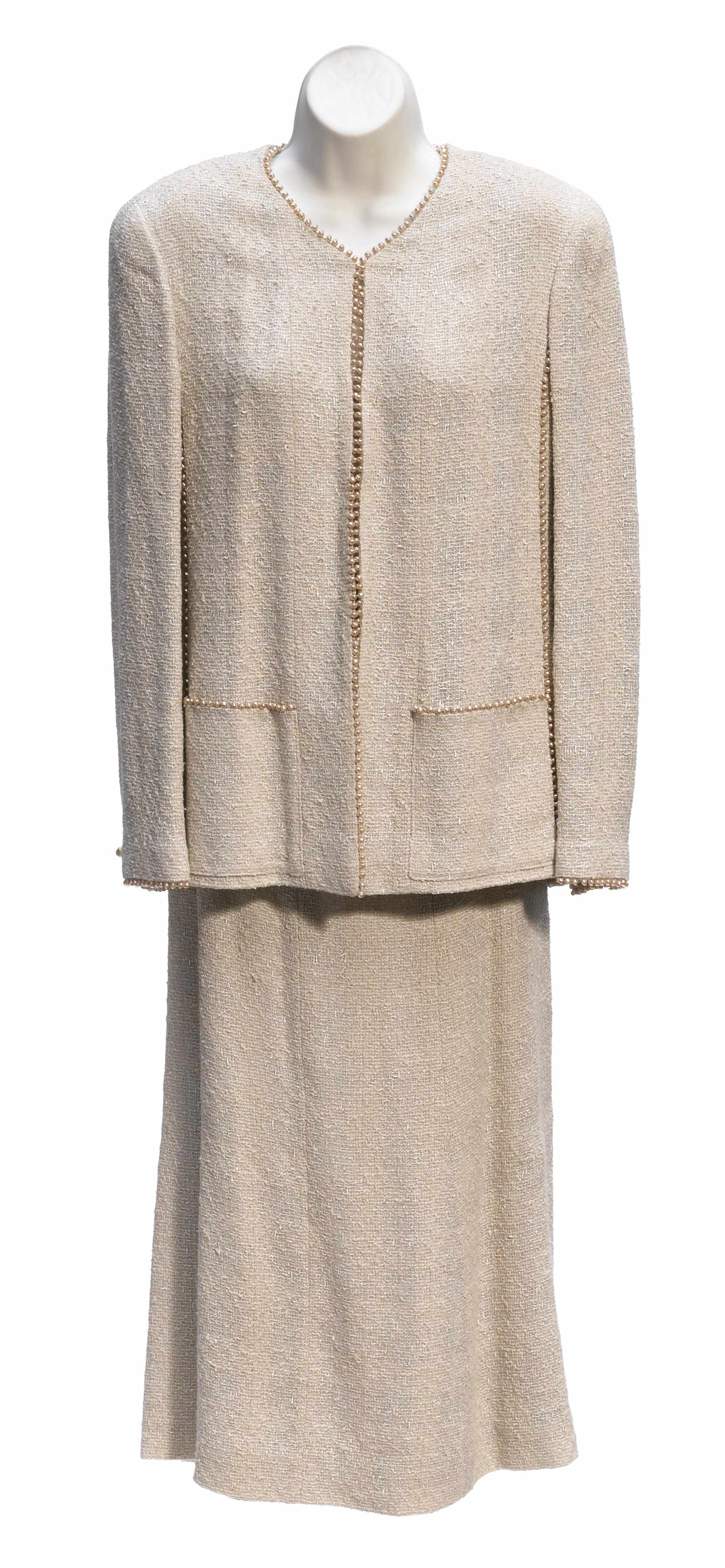 Appraisal: A Chanel boucl taupe pearl beaded jacket and skirt suit