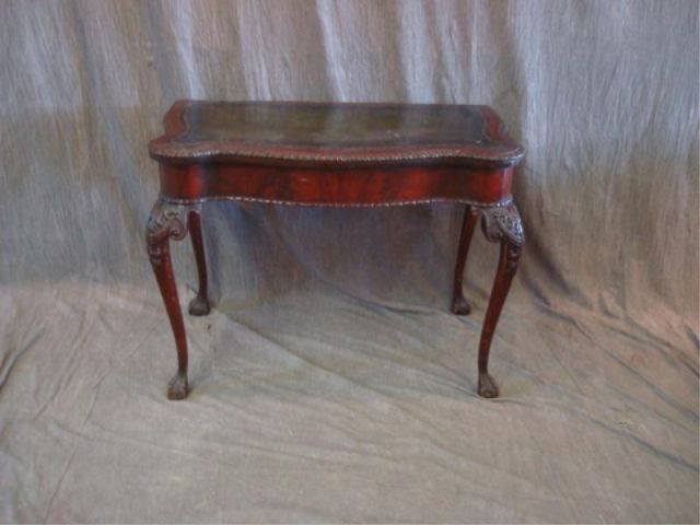 Appraisal: Chippendale style leathertop extension table w leaves high x wide