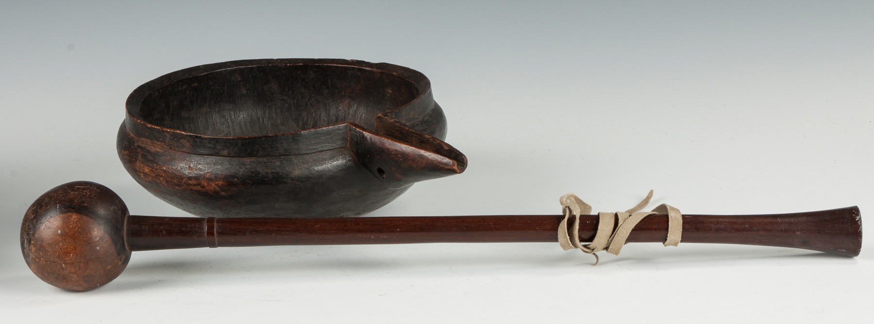 Appraisal: African Club Effigy Bowl Together with carved wooden trencher