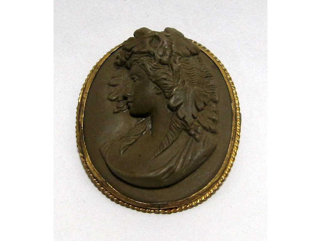 Appraisal: Victorian lava cameo brooch depicting a maiden in profile with