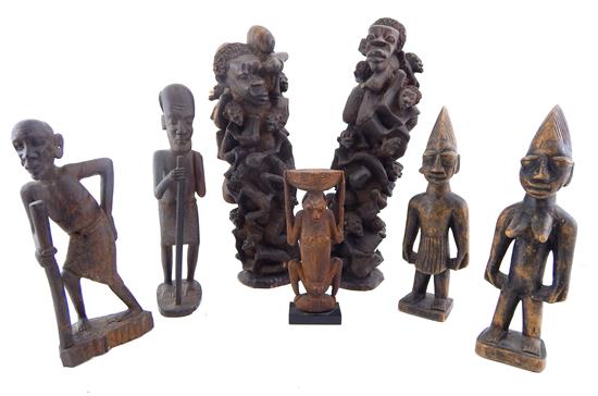 Appraisal: TRIBAL Group of seven carved African figures pair of Yuroba