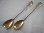 Appraisal: A pair of Georgian silver salad servers Old English with