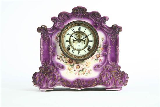 Appraisal: MANTLE CLOCK Eight day time and strike clock with porcelain