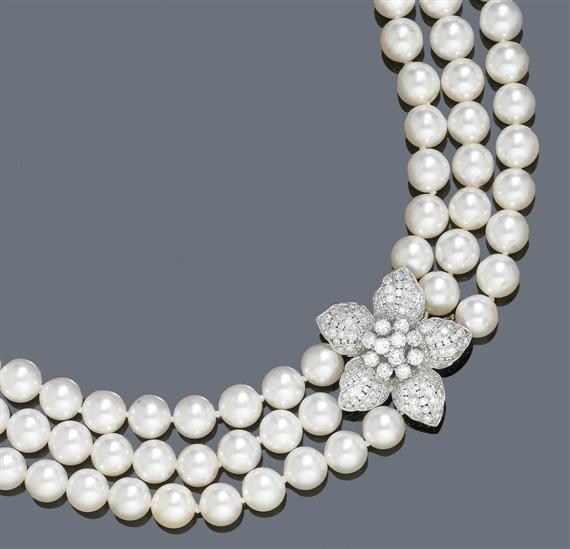 Appraisal: PEARL AND DIAMOND NECKLACE White gold Decorative three-row necklace of