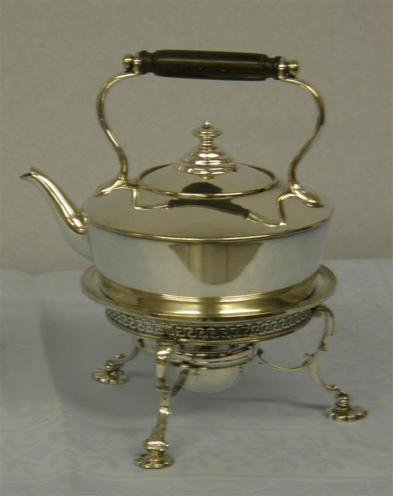 Appraisal: Early twentieth century silver plated kettle on stand with ebonised