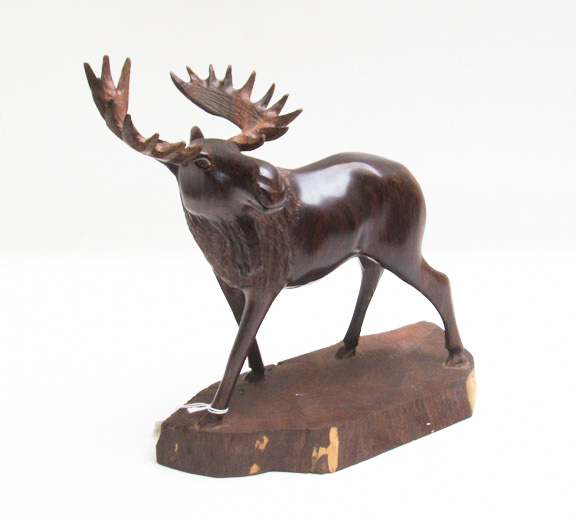 Appraisal: CARVED IRONWOOD MOOSE carved from a single piece of wood