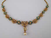 Appraisal: An antique yellow metal tests carat gold turquoise and seed