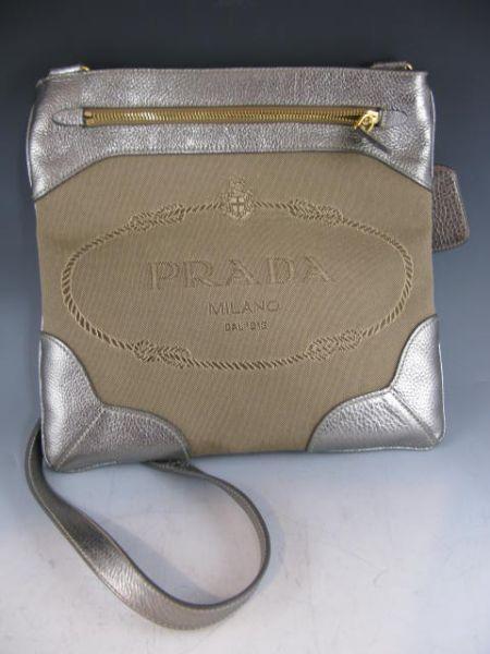 Appraisal: Prada Silver Leather and Canvas Bag with center logo embroidered