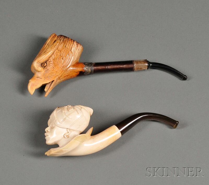 Appraisal: Two Carved Meerschaum Pipes the first carved as an eagle's