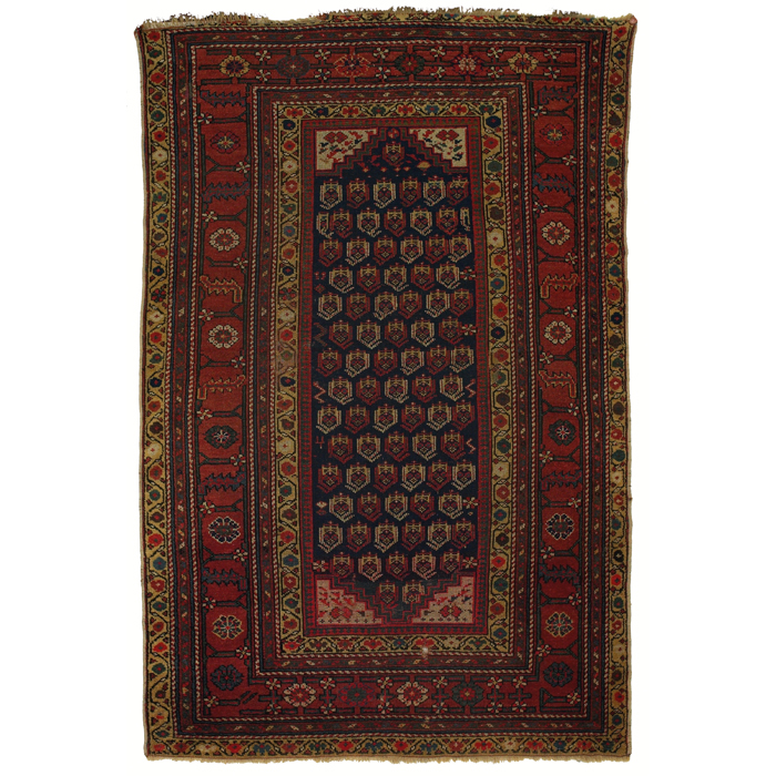 Appraisal: Persian Kurdish rug c stylized floral pattern in red blue