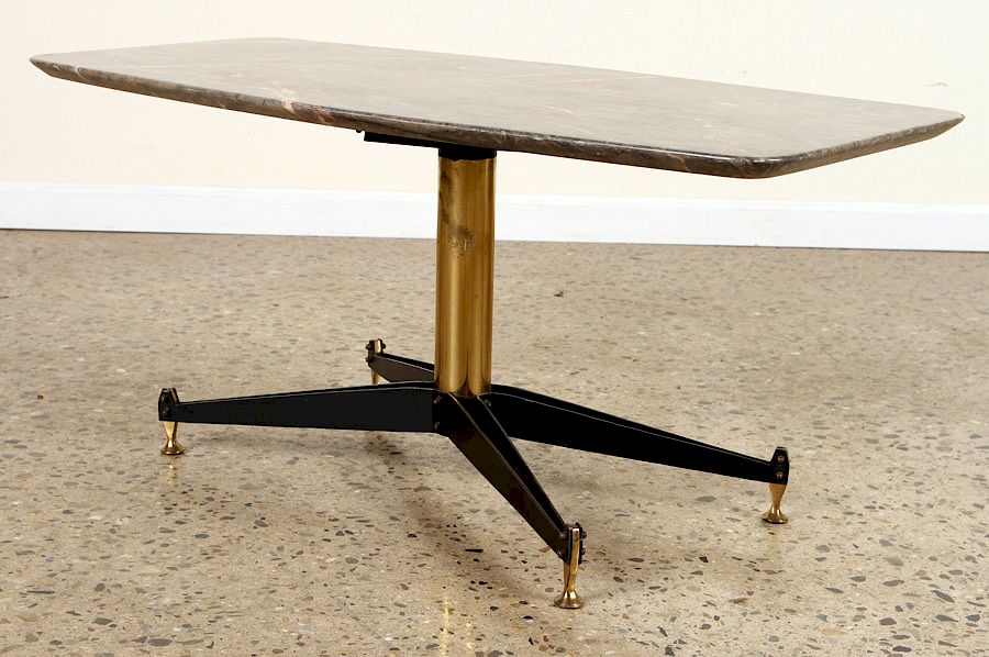 Appraisal: ITALIAN IRON BRASS MARBLE TOP COFFEE TABLE C An Italian