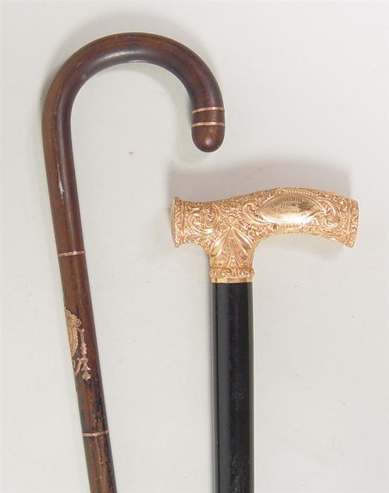 Appraisal: Two th Century Canes One with gold filled monogrammed cartouche