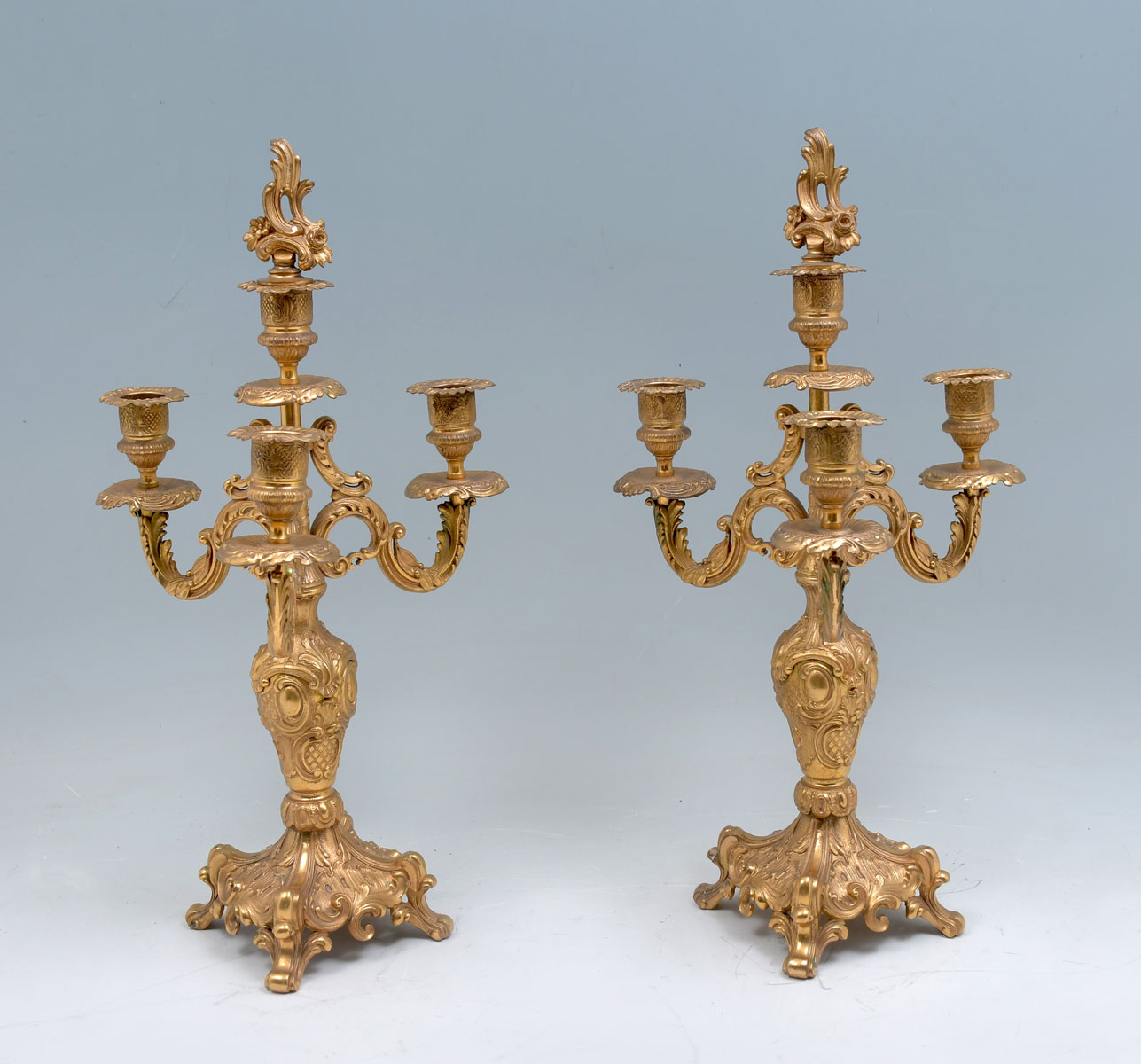 Appraisal: PAIR OF LIGHT BRONZE CANDELABRUM Overall scrolling foliate design Approx