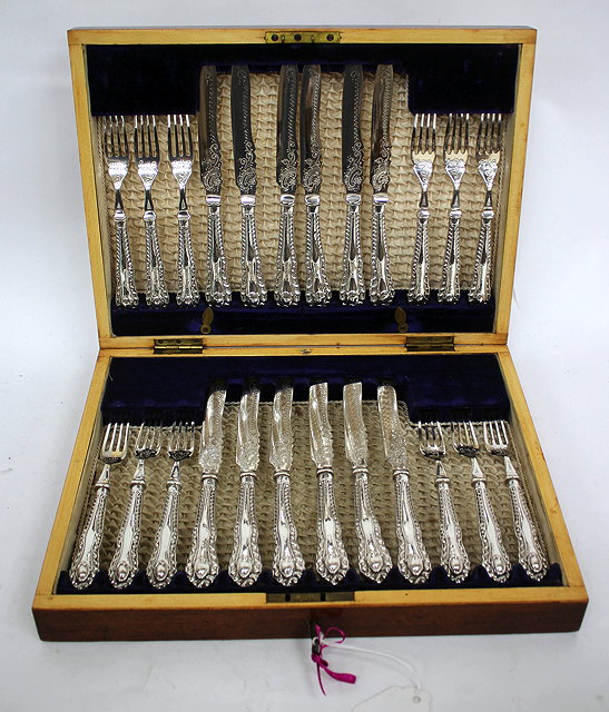 Appraisal: A CASED SET OF PAIRS OF SILVER HANDLED FRUIT KNIVES