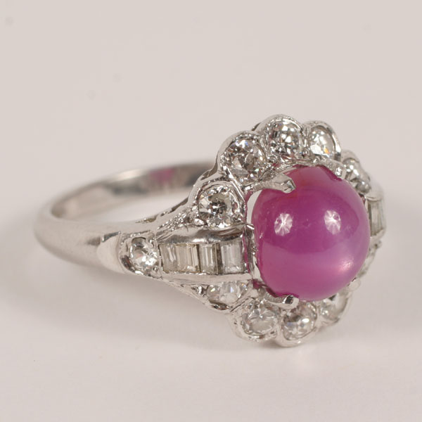 Appraisal: Platinum ring set with one star ruby measuring mm x