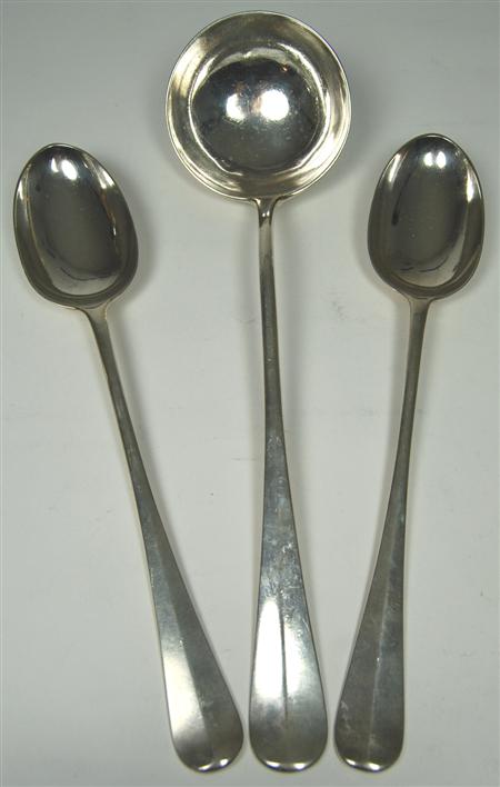 Appraisal: A late Victorian pair of serving spoons and matching ladle