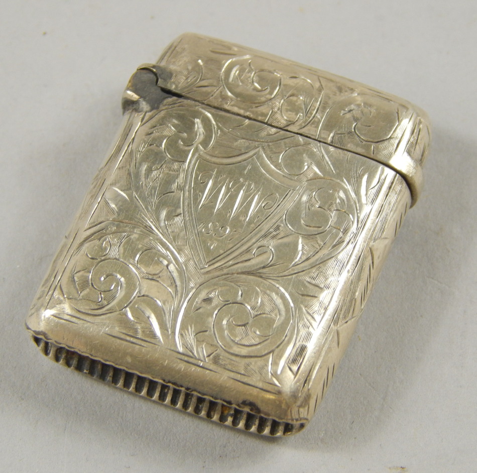 Appraisal: A Victorian engraved silver vesta case the central cartouche bearing