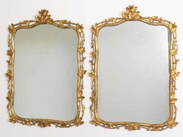 Appraisal: PAIR OF VICTORIAN STYLE CARVED OAK LEAF MIRRORS x Pair