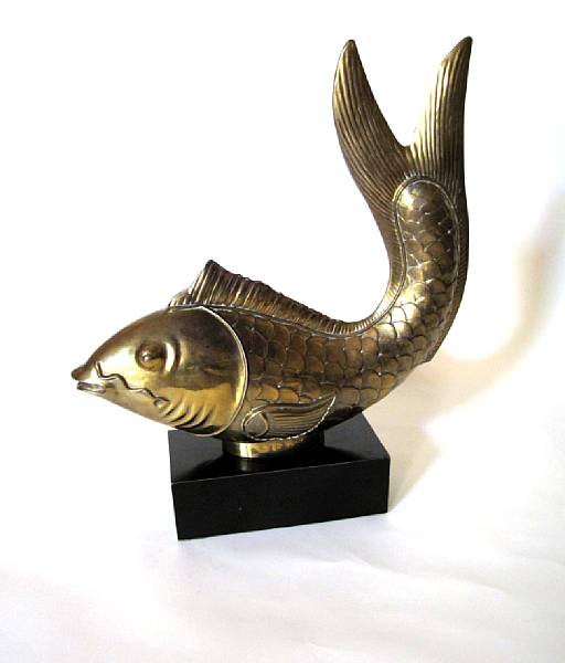 Appraisal: A Continental brass fish on ebonized standcirca The naturalistic rounded