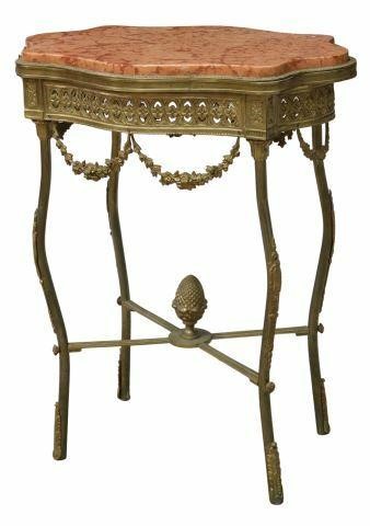 Appraisal: French gilt metal side table mid th c cartouche-shaped inset