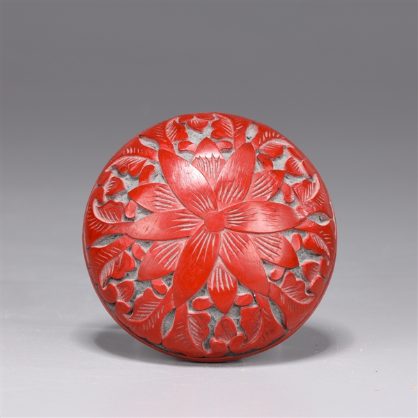 Appraisal: Chinese carved cinnabar lacquered seal paste box with floral designs