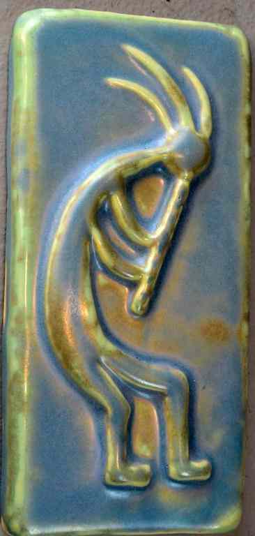 Appraisal: Tile of Kokopelli by Bill Beaver PotteryLight blue glazed decoratie