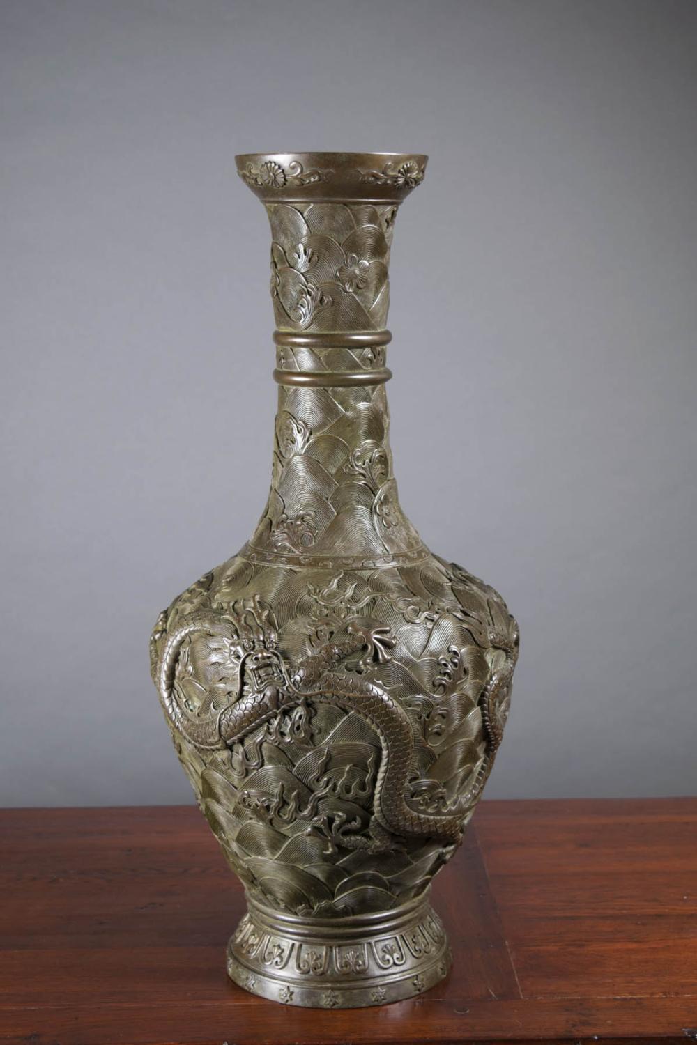 Appraisal: CHINESE BRONZE DRAGON VASE attributed Qing Dynasty - cast with