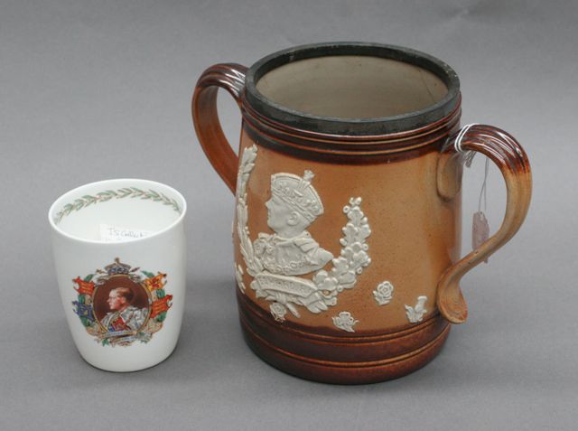 Appraisal: A Doulton salt glazed stoneware loving cup of the intended