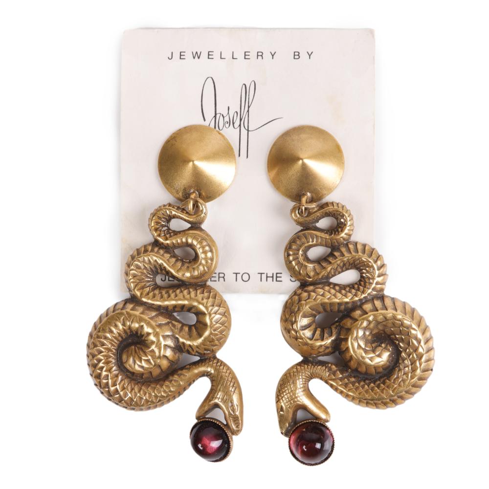 Appraisal: JOSEFF OF HOLLYWOOD EGYPTIAN REVIVAL SNAKE EARRINGS WITH PURPLE DOMED