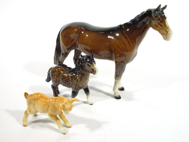 Appraisal: Large hand painted Beswick horse a pony and a kid