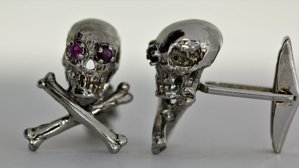 Appraisal: PR K WHITE GOLD RUBY SKULL CROSS BONE CUFFLINKS th