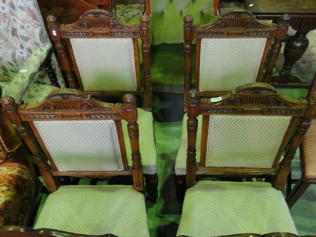 Appraisal: A set of four good quality oak dining chairs with