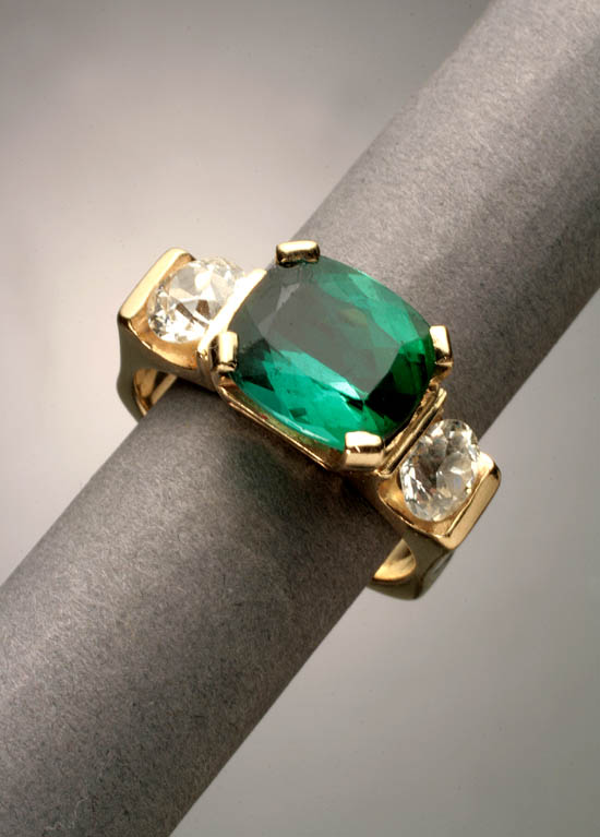 Appraisal: -Karat Yellow-Gold Tourmaline and Twin-Diamond Dinner Ring The four-prong mount