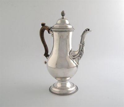 Appraisal: A George III vase-shaped coffee pot with beaded borders cast