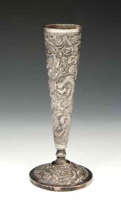 Appraisal: A CHINESE SILVER TAPERING VASE embossed with dragons high and