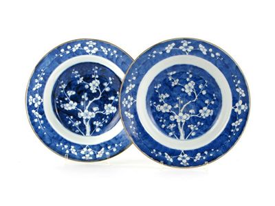 Appraisal: A pair of Chinese blue and white prunus decorated soup