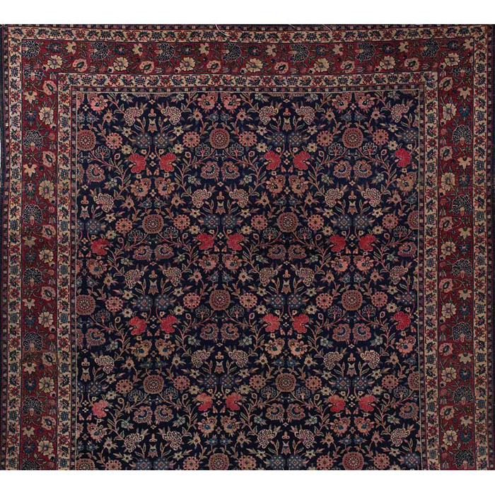 Appraisal: Tabriz rug c stylized floral design on a dark blue