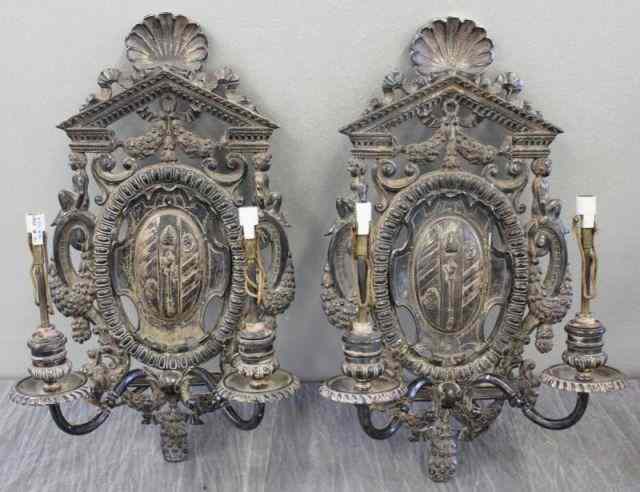 Appraisal: Pair of Large Caldwell Heraldic Style Sconces Silverplated with cherubs