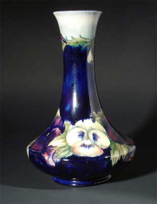 Appraisal: Pansy' a Moorcroft Pottery vase designed by William Moorcroft painted