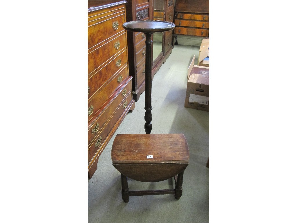 Appraisal: A mahogany torchere