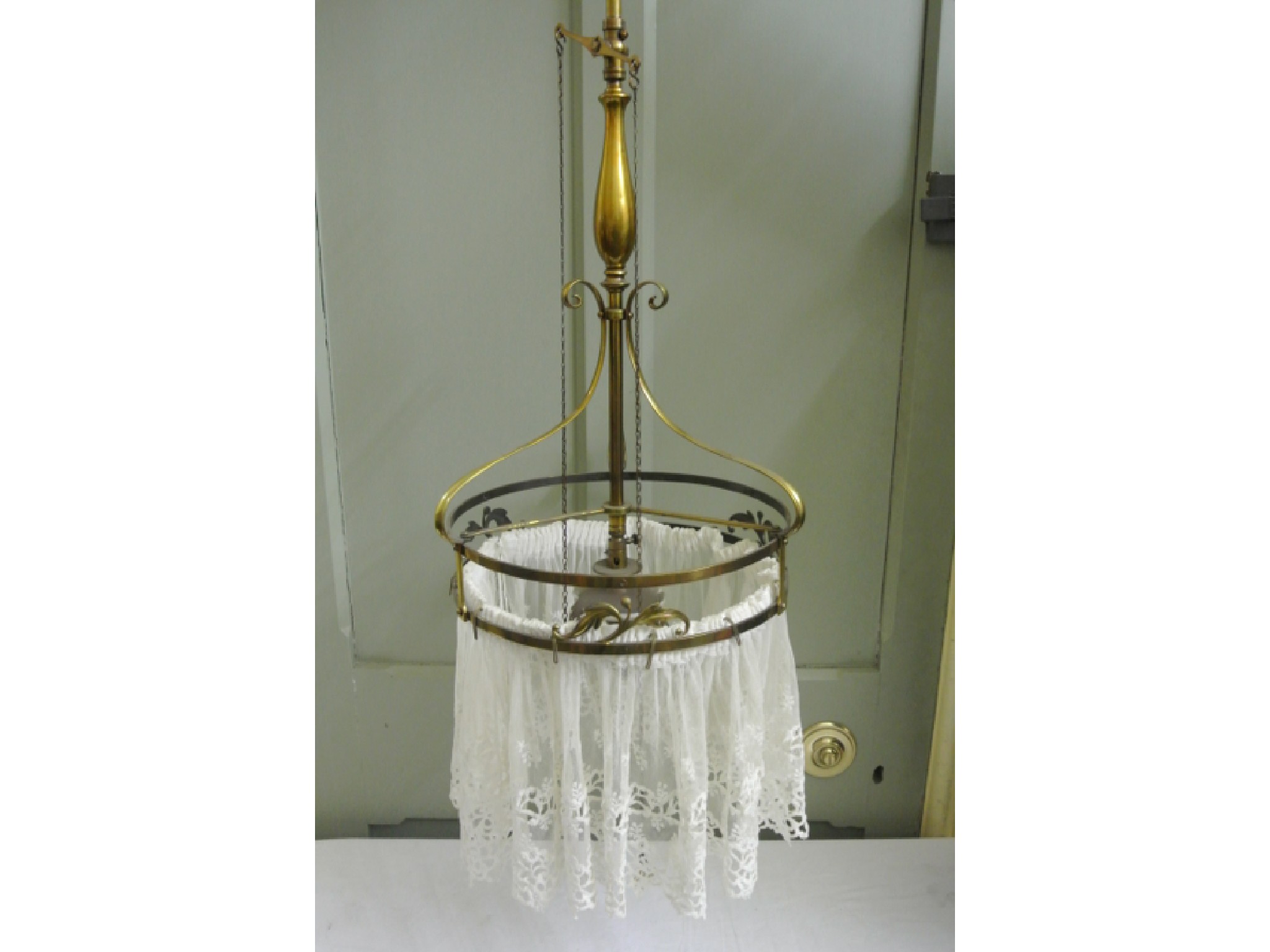 Appraisal: An Edwardian Art Nouveau style brass hanging gas ceiling light