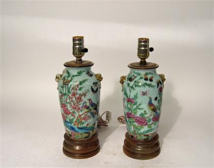 Appraisal: Pair Chinese porcelain vases th century th century Each decorated