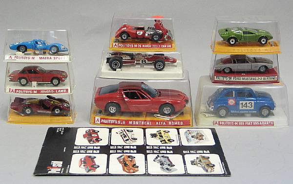 Appraisal: Politoy Vehicles Assortment of Italian die-cast vehicles encased in plastic