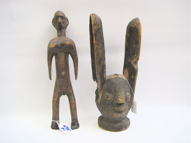 Appraisal: DOGAN WOMAN'S FETISH AND YORUBA FIGURE both hand carved wood