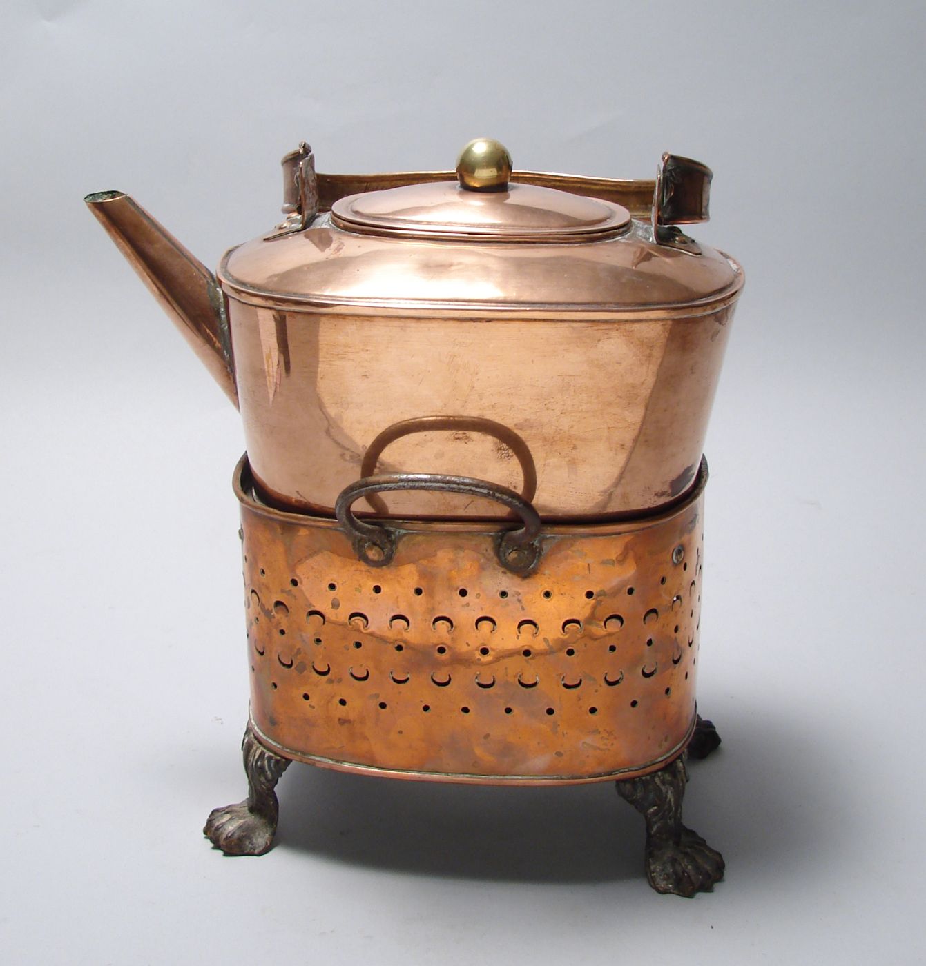 Appraisal: COPPER TEA KETTLE ON WARMING BASE th CenturyIn oval form