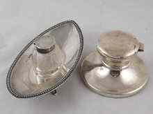 Appraisal: A silver capstan inkwell cm dia Birmingham and a navette